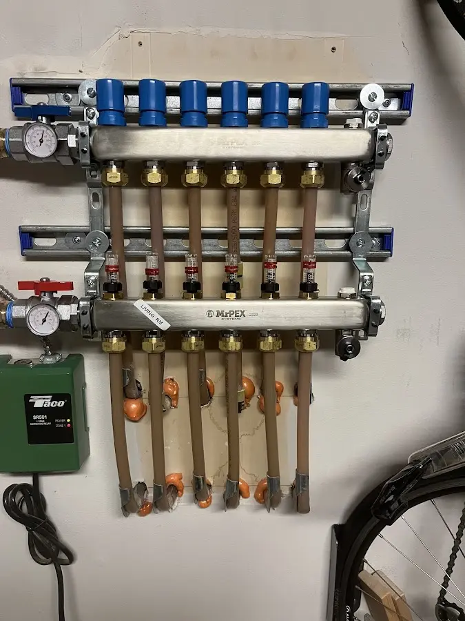 Plumber performing Water Heater Repair at a residential property in Naples Park